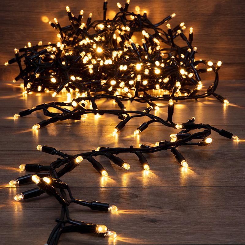 Гирлянда светодиодная "Кластер" 10м 400LED тепл. бел. 36Вт IP67 соединяемая провод каучук черн. Neon-Night 315-266